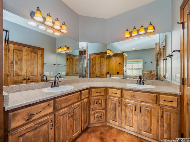 bathroom featuring a sink and double vanity