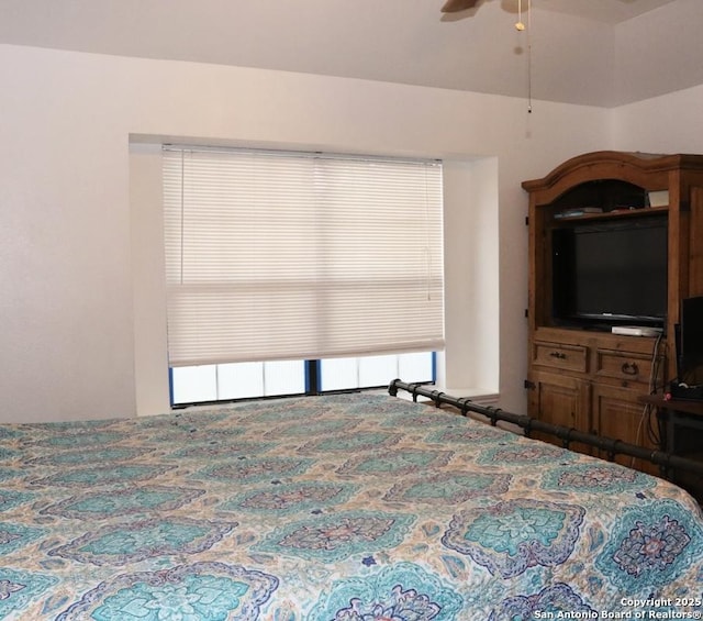 bedroom featuring radiator