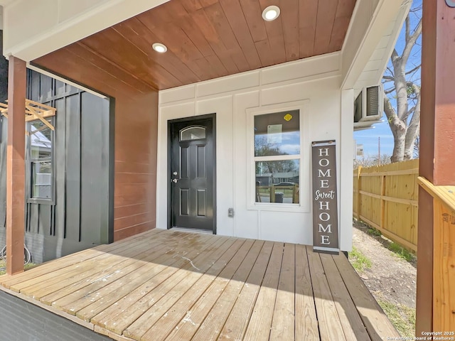 wooden deck featuring fence