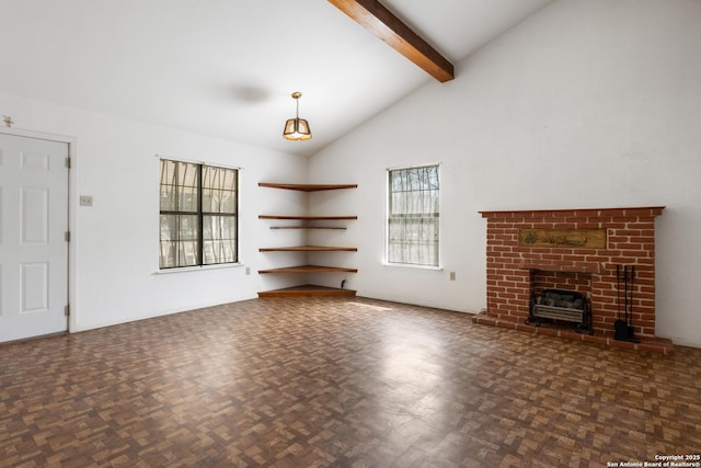 unfurnished living room with beam ceiling, a brick fireplace, and high vaulted ceiling