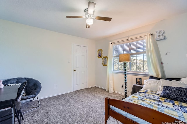 bedroom with carpet, baseboards, and ceiling fan