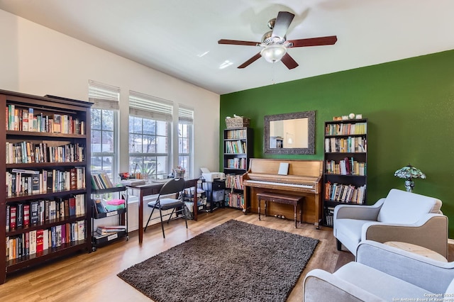 office space featuring ceiling fan and wood finished floors