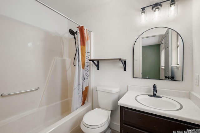 bathroom featuring shower / bath combo with shower curtain, toilet, and vanity