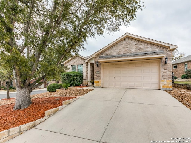 ranch-style house with brick siding, driveway, and an attached garage