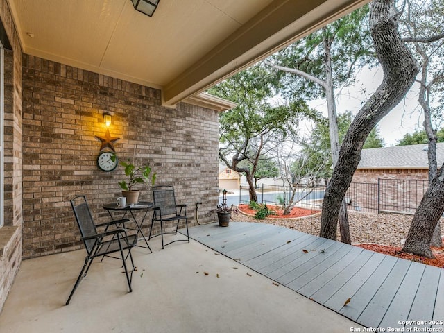 view of patio with fence