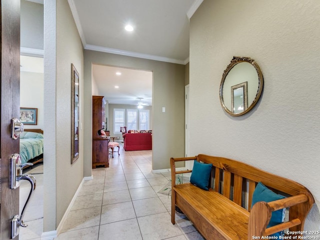 hall with crown molding, light tile patterned flooring, recessed lighting, and baseboards