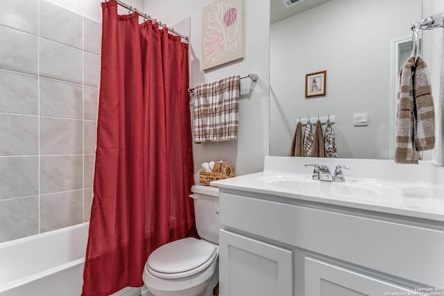 full bath with visible vents, toilet, shower / bath combo, and vanity