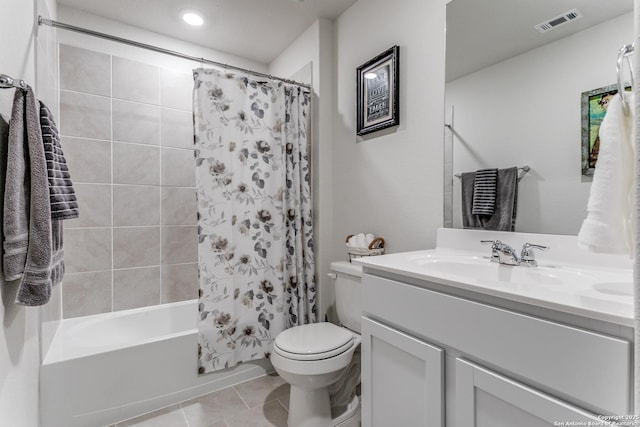 bathroom featuring vanity, visible vents, tile patterned floors, toilet, and shower / tub combo with curtain