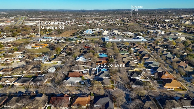 birds eye view of property with a residential view