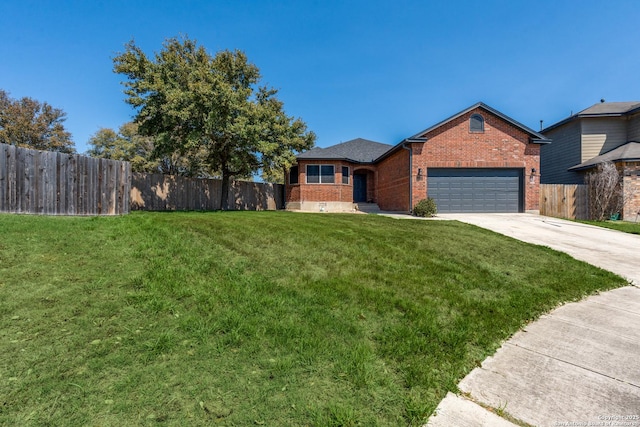 single story home featuring brick siding, fence, concrete driveway, a front yard, and a garage