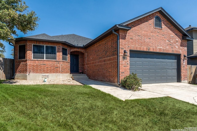 ranch-style home featuring driveway, fence, a front yard, a garage, and brick siding