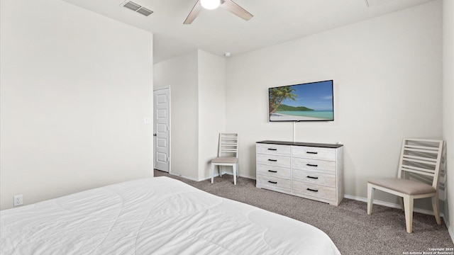 bedroom with visible vents, carpet flooring, baseboards, and a ceiling fan