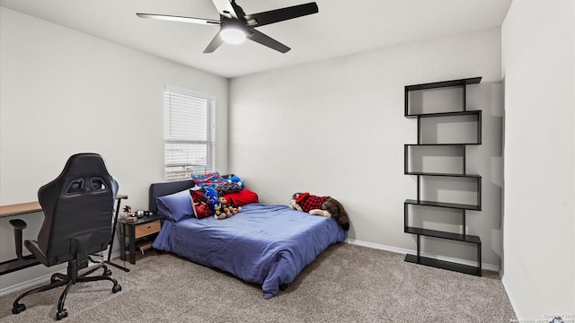 bedroom with carpet, baseboards, and ceiling fan