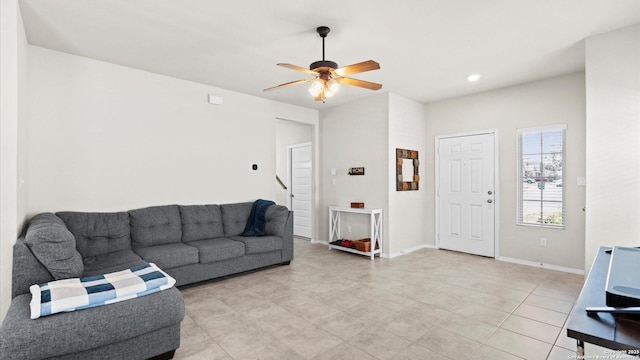 living area featuring recessed lighting, baseboards, and ceiling fan