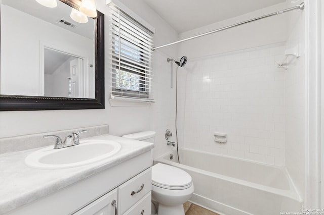 full bathroom featuring shower / bath combination, visible vents, toilet, and vanity