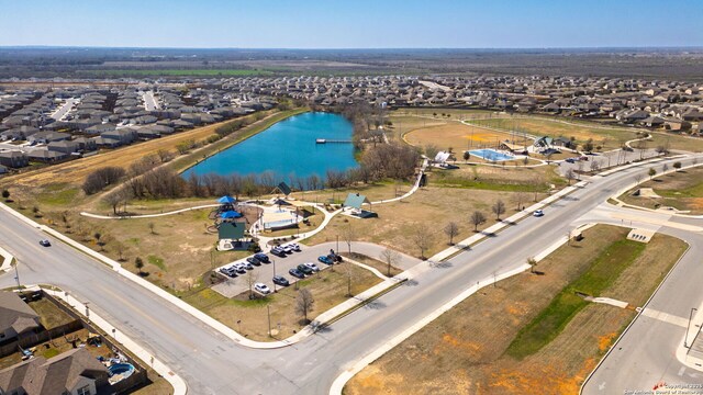 aerial view with a water view and a residential view