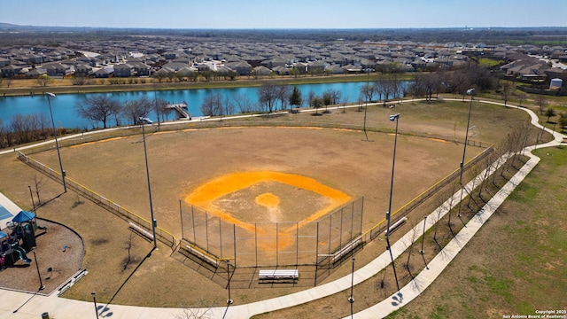 aerial view featuring a residential view and a water view