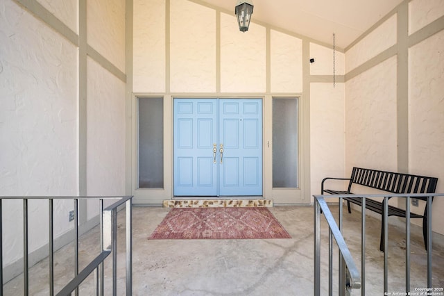 view of exterior entry with stucco siding