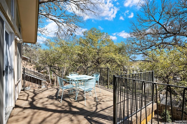 balcony featuring outdoor dining area