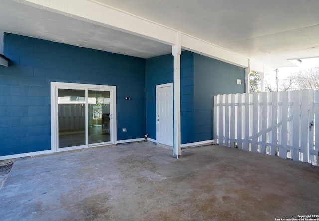 view of patio / terrace featuring fence