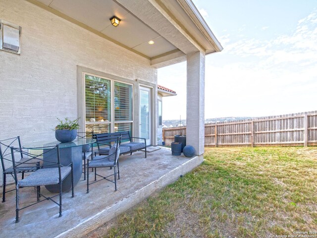 view of patio with fence