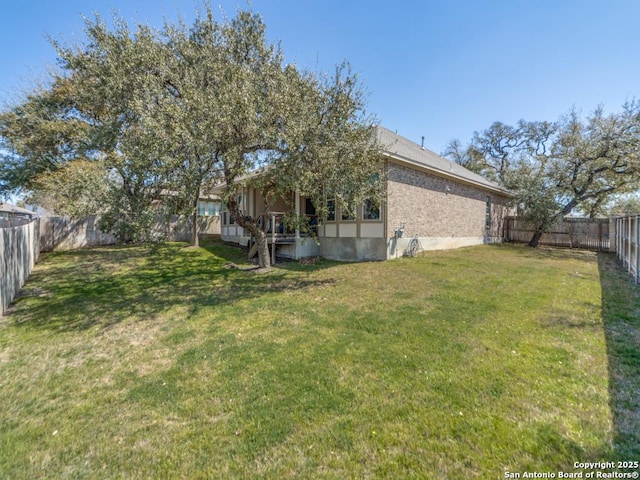 view of yard featuring a fenced backyard