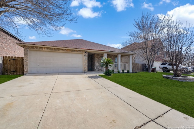 ranch-style home featuring brick siding, fence, a front yard, a garage, and driveway