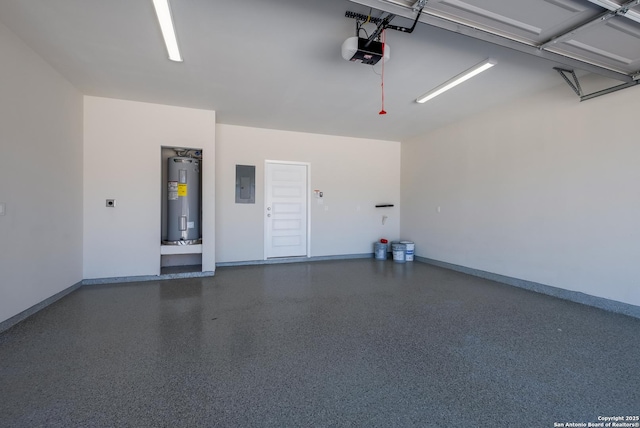 garage featuring electric panel, a garage door opener, water heater, and baseboards