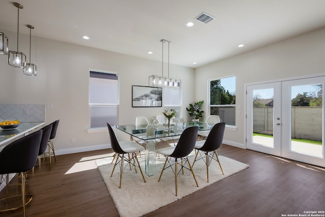 dining space featuring visible vents, baseboards, recessed lighting, french doors, and dark wood-style flooring