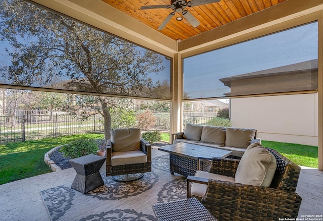 view of patio with a fenced backyard, ceiling fan, and outdoor lounge area