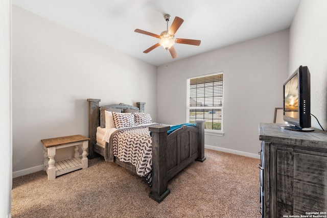 bedroom with baseboards, a ceiling fan, and carpet flooring