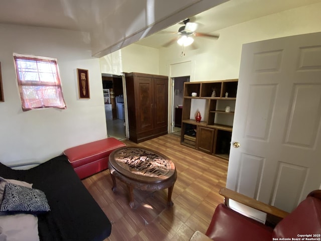 living room featuring a ceiling fan