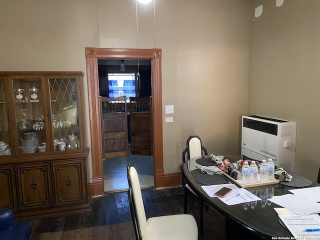 office space with dark wood-style flooring