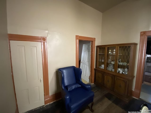 sitting room featuring wood finished floors