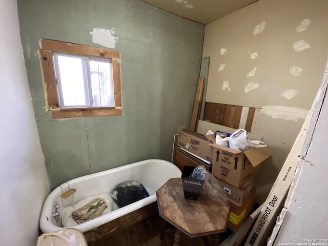 bathroom featuring a soaking tub