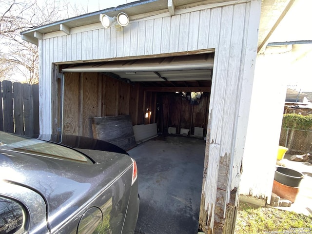 garage featuring fence