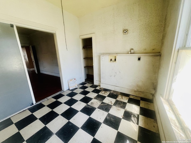 spare room with tile patterned floors