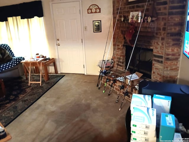 living area with a fireplace and concrete flooring