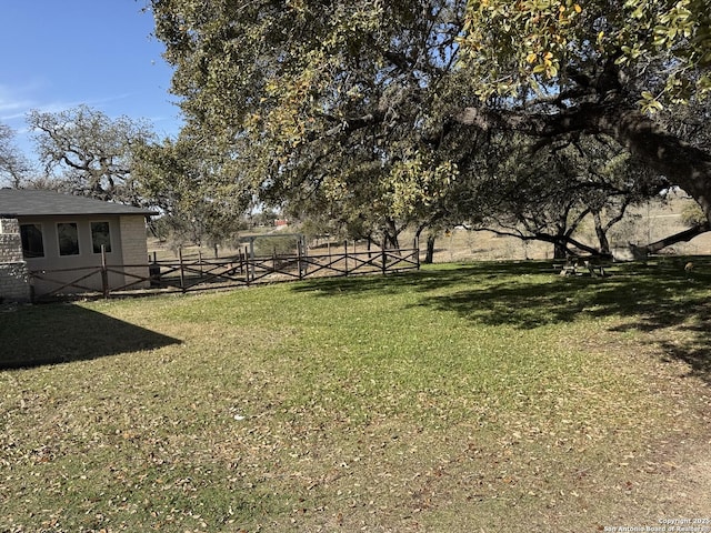 view of yard featuring fence