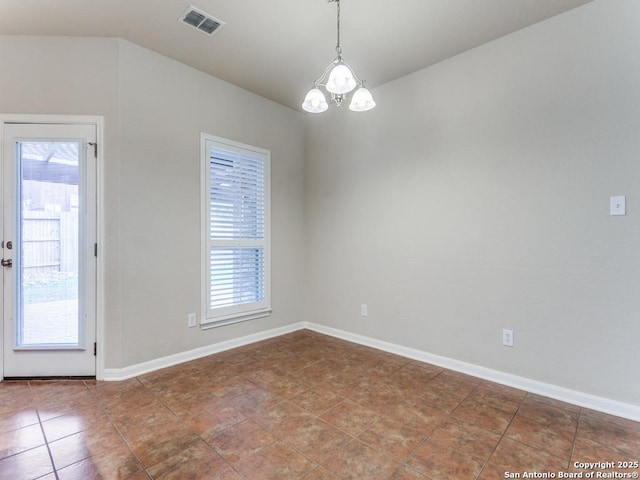 tiled empty room featuring baseboards, visible vents, and a chandelier