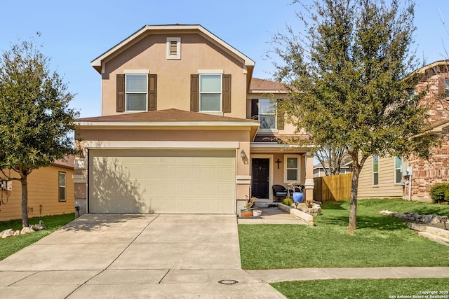 traditional-style house featuring a front lawn, fence, concrete driveway, stucco siding, and a garage