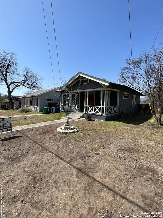 view of front of home featuring covered porch