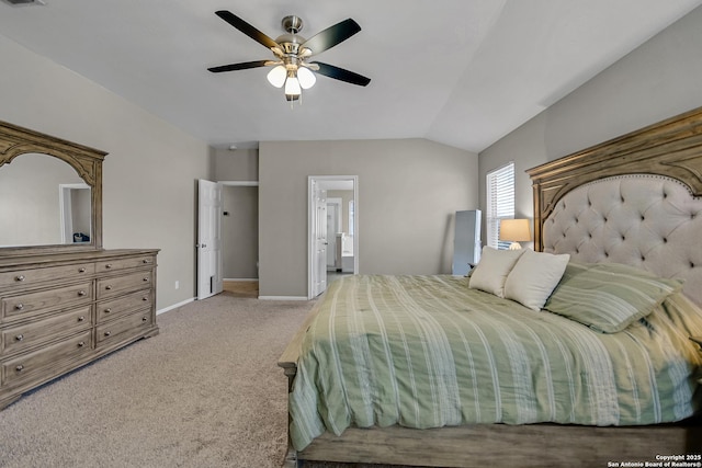 bedroom featuring visible vents, connected bathroom, baseboards, light colored carpet, and vaulted ceiling