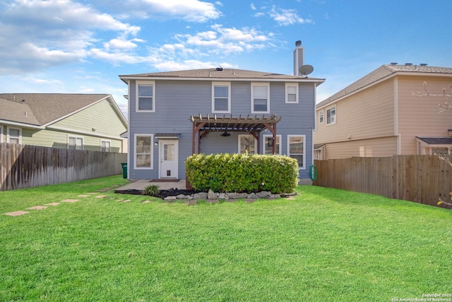 rear view of property with a yard, a patio, a fenced backyard, and a pergola