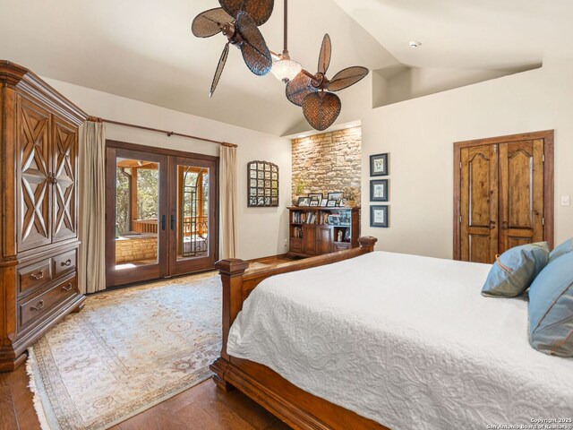 bedroom featuring a ceiling fan, access to exterior, french doors, and vaulted ceiling