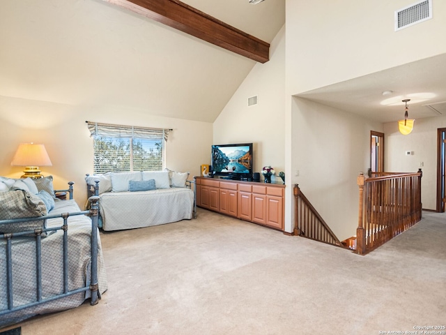 bedroom featuring visible vents, beam ceiling, high vaulted ceiling, and light carpet