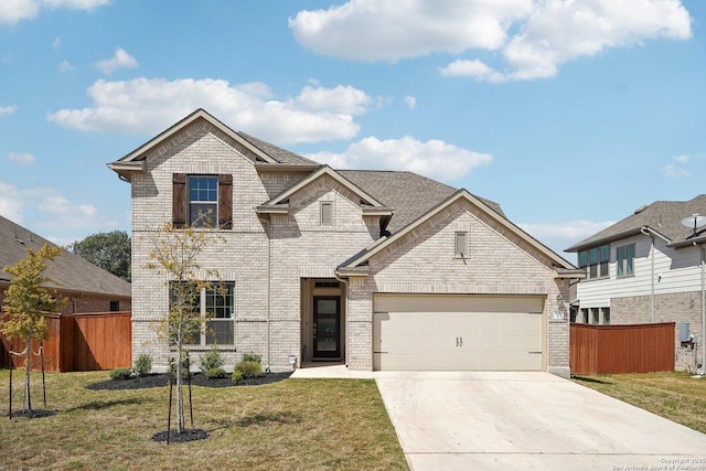 view of front of home featuring brick siding, driveway, a front lawn, and fence