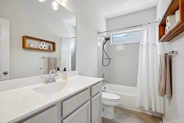 full bath with vanity, tile patterned floors, shower / tub combo, and toilet