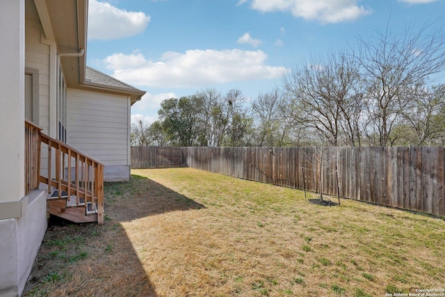 view of yard featuring a fenced backyard