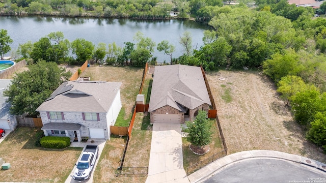 bird's eye view with a water view